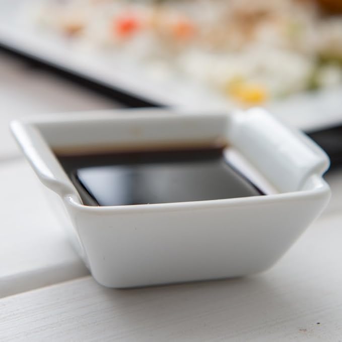 Restaurantware 1 Ounce Soy Sauce Dishes 10 Lipped Dipping Bowls - Built-In Handles Stain-Resistant White Porcelain Mini Bowls Dishwasher-Safe For Appetizers And Condiments