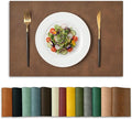 Artoid Mode Brown Faux Leather Placemats Set of 4, 12x18 Inch Waterproof Wipeable Heat Resistant Vinyl Place Mats, Reversible Table Mats for Kitchen Dining Decor