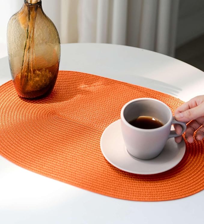 FunWheat Oval Braided Placemats Set of 8 Table Mats for Dining Tables Washable Heat Resistant Place Mats for Indoor Outdoor Use 12 x18 Inch(Oval Orange, 8pcs)