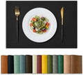 Artoid Mode Black Faux Leather Placemats Set of 4, 12x18 Inch Waterproof Wipeable Heat Resistant Vinyl Place Mats, Reversible Table Mats for Kitchen Dining Decor