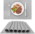 DACHUI Placemats Set of 4, Linen Look Woven Place Mats, Water Resistant, Heat Resistant, Washable, Durable Table Mats (Light Grey)