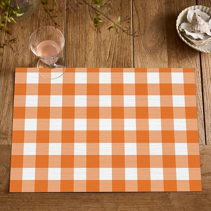Artoid Mode Buffalo Plaid Vinyl Placemats Set of 4, 12x18 Inch Washable Non-Slip Heat Resistant Plastic Place Mats for Party Dining Table, Orange/White