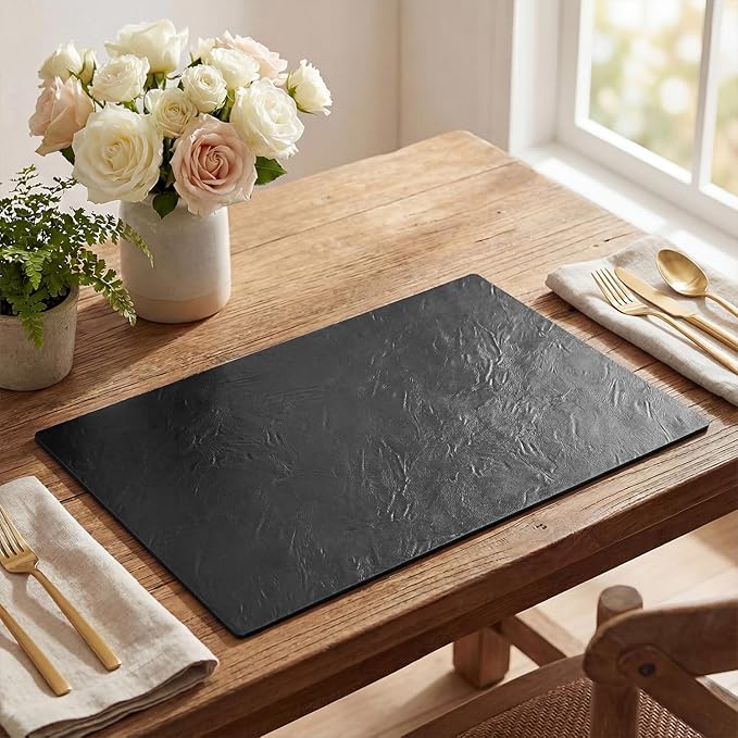 Artoid Mode Black Faux Leather Placemats Set of 4, 12x18 Inch Waterproof Wipeable Heat Resistant Vinyl Place Mats, Reversible Table Mats for Kitchen Dining Decor