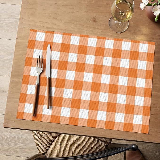Artoid Mode Buffalo Plaid Vinyl Placemats Set of 4, 12x18 Inch Washable Non-Slip Heat Resistant Plastic Place Mats for Party Dining Table, Orange/White