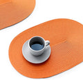 FunWheat Oval Braided Placemats Set of 6 Table Mats for Dining Tables Woven Washable Non-Slip Shining Place mats12x18 Inch Table mats for Indoor Outdoor Use(Oval Orange, 6pcs)