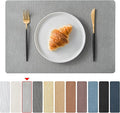 Jovono Faux Leather Placemats Set of 4, Waterproof Washable Table Mats, Easy-Clean Heat Resistant Kitchen Vinyl Place Mat for Dining Table, Restaurant, Indoor, 17.8"x11.8", Light Gray