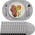 Placemats Set of 12 Washable, Heat Resistant Table Placemats Wipeable Faux Leather Oval Place Mats Non Slip, Waterproof Oval Table Mats for Indoor Outdoor, Gray